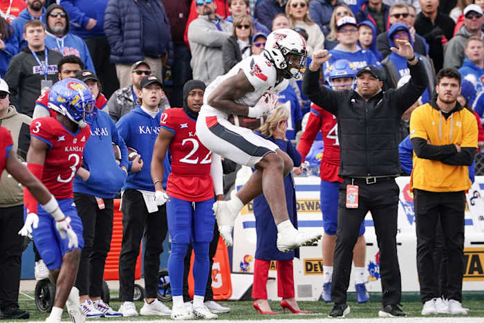 Texas Tech wide receiver Jerand Bradley catches a pass against the Kansas Jayhawks.